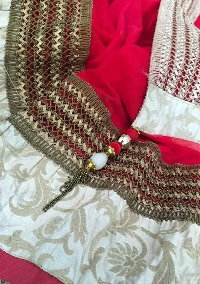 Fully Sequeens worked on the jacket with  copper, gold and red thread. stones are attached. Rich cotton, silk,  red colour Lahenga Dress. view 2
