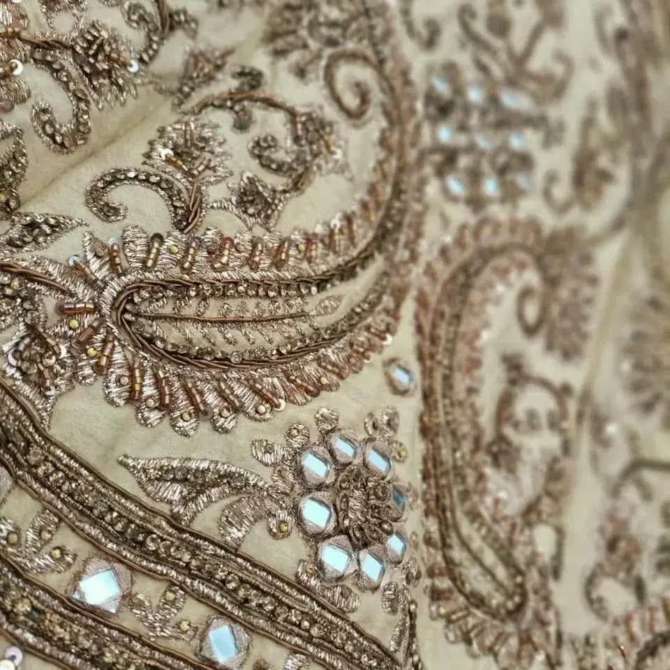 Fully Zardozi worked with  copper and gold thread. stones and mirrors attached. Raw silk biscuit colour Anarkali Dress. view 2
